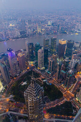 Naklejka premium Aerial view of Shanghai skyscrapers with Huangpu river, China
