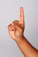Hand shows number one , Number one index finger isolated background