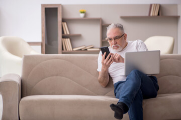 Old man sitting at home