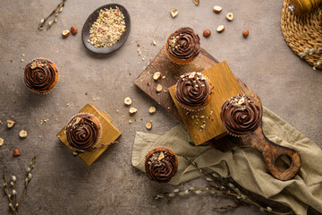 Chocolate chip muffins decorated with chocolate ganache