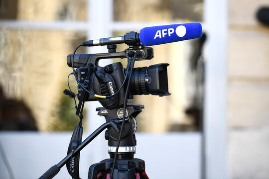 Illustration picture shows a TV television camera and a microphone with the logo of the French press agency "AFP" ("Agence France-Presse") at the Hotel Matignon, on April 4, 2023 in Paris, France.