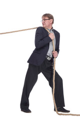 serious business man pulls a tightrope. isolated on a white background.