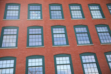 Old brick buildings symbolize nostalgia, history, durability, and a sense of permanence evoking a sense of timelessness and represent the architectural heritage of a place