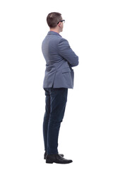 Side view of confident businessman with arms folded against white background