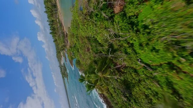 Vertical Drone Flying Over Playa Los Coquitos In Cabrera, Mar&iacute;a Trinidad S&aacute;nchez, Dominican Republic. FPV