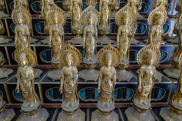 Nagoya, Japan - March 15, 2023: Buddha statues in the Osu Kannon is a Buddhist temple located in Nagoya, Japan.