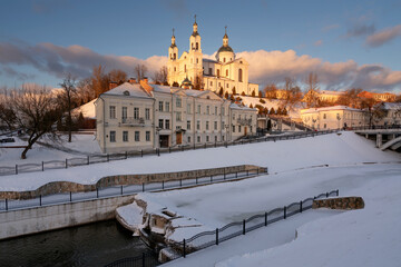 View of the Assumption Mountain, the Holy Spirit Monastery and the Holy Assumption Cathedral on the banks of the Western Dvina and Vitba rivers on a sunny winter day, Vitebsk, Belarus