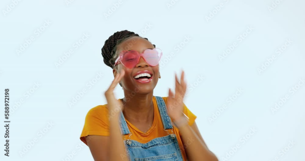 Sticker Face, happy and black woman blowing kiss with sunglasses isolated on a white background in studio. Smile, playful and portrait of a stylish African girl showing fashionable eyewear on a backdrop