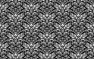 Fototapeta premium Wallpaper in the style of Baroque. Seamless vector background. White and black floral ornament. Graphic pattern for fabric, wallpaper, packaging. Ornate Damask flower ornament