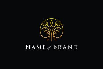 Lush tree logo with gold color combination looks luxurious and beautiful
