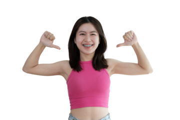 Young Asian woman pointing finger at herself, Concept of love yourself and believe in yourself, self esteem, Pointing two thumbs at herself, Isolated over PNG file.