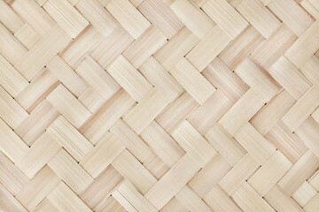Old bamboo weaving pattern, woven rattan mat texture for background and design art work.