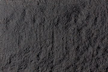 Fertile loam soil suitable for planting, soil texture background. Top view of fresh soil. Concept...