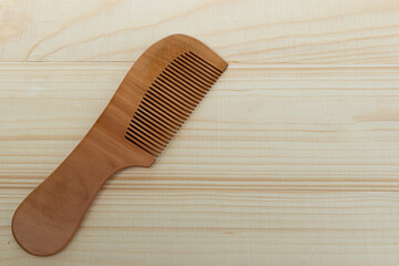 Close-up. wooden combs, hair combs and personal care on background. hair treatment concept.