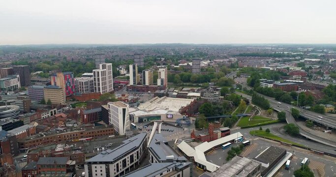 Coventry aerial push in shot above city towards the university campus