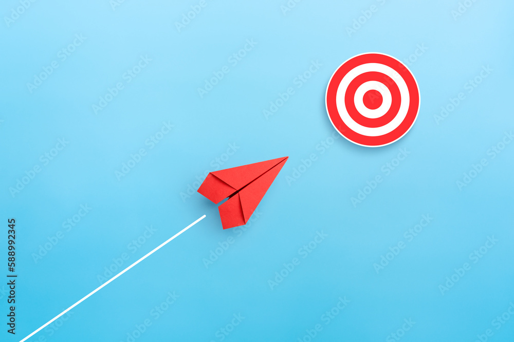 Wall mural Target concept with red paper plane. target icon