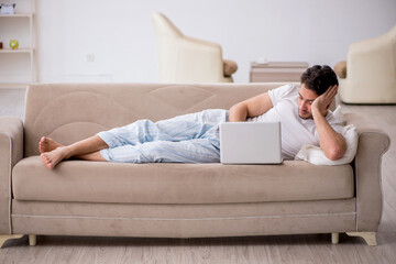 Young man starting day at home