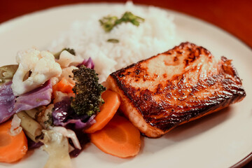 Grilled salmon, rice and vegetables