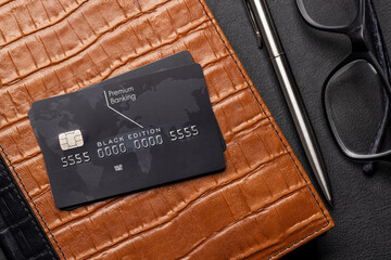 Black credit card on office table