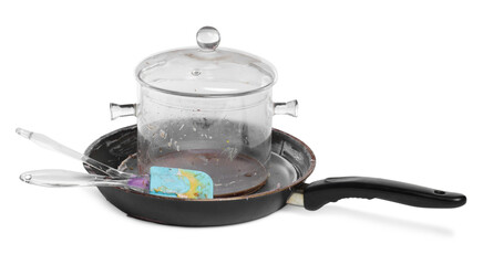 Many different dirty dishes on white background