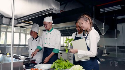 4K, Two schoolgirls, attending cooking class, they are helping choose raw vegetables for chef according chef's order needs, both were confused because they didn't know type vegetables chef wanted.