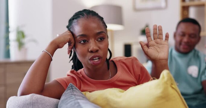 Angry couple, fight and argument of woman with problem, drama and anger of conflict in home lounge. Divorce, breakup and black female in toxic relationship, emotions and ignoring cheating partner