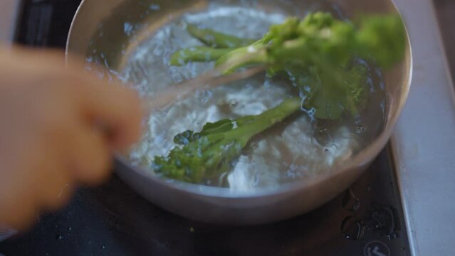 Blanching Broccolini in Steel Pan