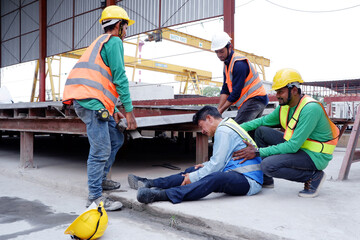 construction worker accident and colleagues to help.