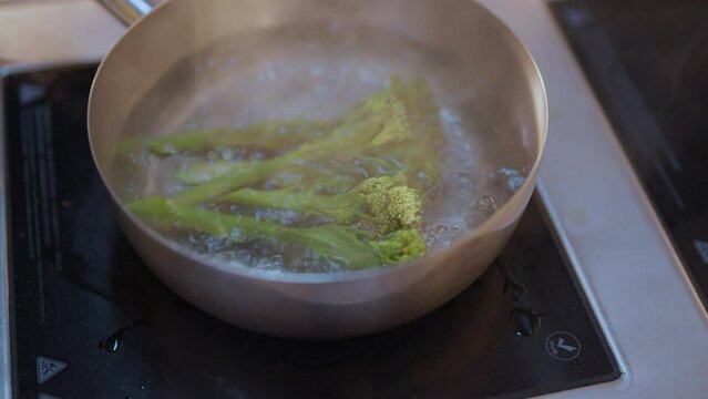Blanching Broccolini in Steel Pan