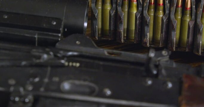 Camera moving from Kalashnikov assault rifle to ammo.