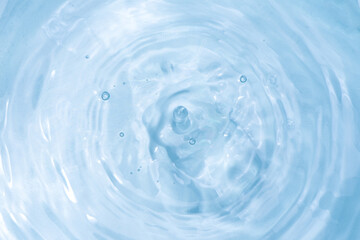 Naklejka na ściany i meble blue clear water texture with splash and bubble.water ripples background.