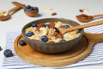 Tasty and nutritious breakfast concept - muesli with yogurt
