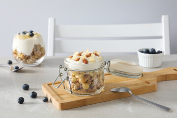 Tasty and nutritious breakfast concept - muesli with yogurt