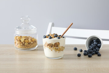 Tasty and nutritious breakfast concept - muesli with yogurt