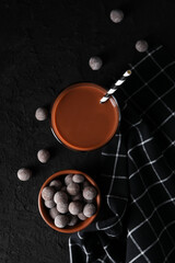 Tasty fresh summer dessert - chocolate milkshake, top view