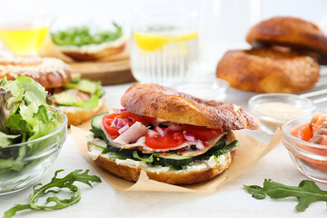 Concept of delicious food - tasty bagel sandwich