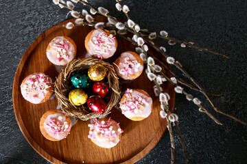 easter pastel handmade group of muffins with confetti chocolate eggs on top