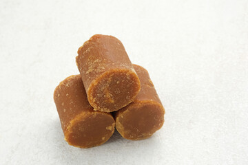 Cylindrical Brown palm sugar, food ingredient
