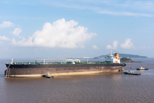 Big tanker ship arriving to dockyard in China. 