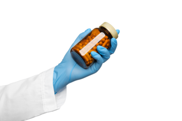 A jar of pills in a hand, a hand in a blue medical glove. Isolate on a white background.