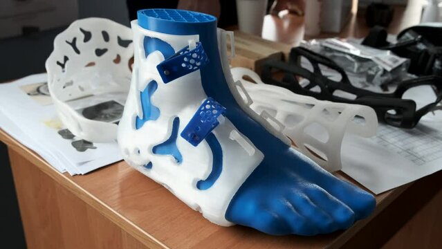 Orthopedic plastic foot prosthesis printed on 3D printer. Modern printing technology