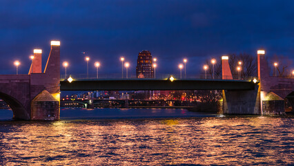 Fototapeta na wymiar Alte Brucke - Old bridge in Frankfurt am Main, Germany. Blue hour time.