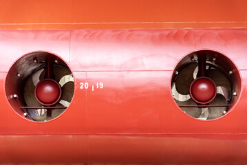 View on the stern thruster propeller of the big container ship. Ship is in the dry dock for...