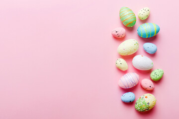 Fototapeta na wymiar decorative easter eggs on colored background. easter eggs collection top view with copy space