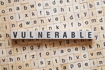 Vulnerable - word concept on cubes