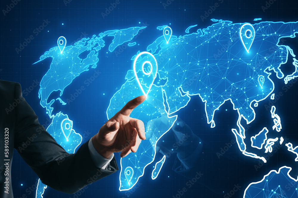 Poster Close up of businessman hand pointing at glowing map with location pins on blurry blue background. GPS and navigation concept.