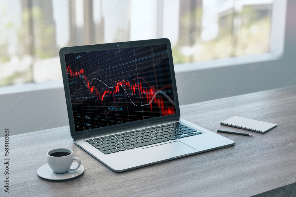 Poster close up of laptop computer with falling red crisis forex chart on screen, coffee cup and notepad. w