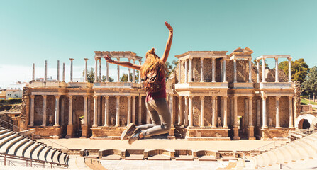 Happy woman tourist in Merida theater in Merida- Extremadura in Spain