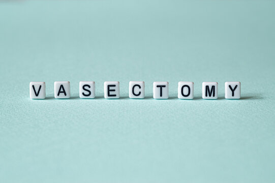 Vasectomy - word concept on cubes