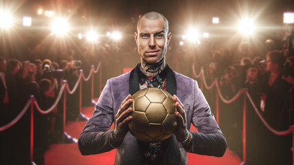 Art of handsome football player dressed in trendy suit holding soccer ball.